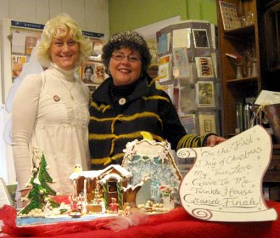 Mardi Ljubich and Bettie Edwards with the winning Gingerbread House