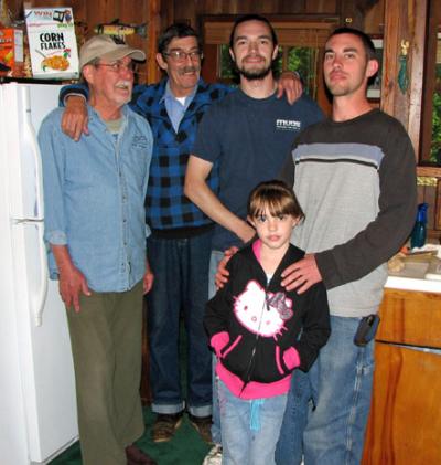 Picture caption: Four generations of Tuels. Left to right, Mark, Rick, Drew, and JD; front, Allysan.