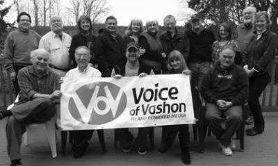 Voice of Vashon board, staff and volunteers on retreat celebrate the FM station license approval. Photo by Craig Beles