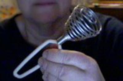 This is a kind of whisk that is the best thing for making gravy. My mother had one, and by the time she died the metal on the bottom was worn thin from decades of whisking.