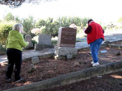 My cousins Charlotte and Nancy photographing the headstones in the Litchfield family plot