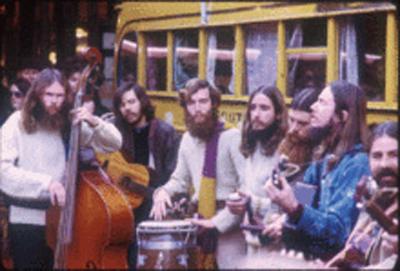 In the photo that accompanies the Wikipedia article about the Love Family, members of the Love Family perform at the 65th Anniversary Celebration of Pike Place Market, 1972. From left to right, Strength Israel, Zeal Israel, Courage Israel, Reality Israel, Integrity Israel, and Encouragement Israel. Photo from Seattle Municipal Archives