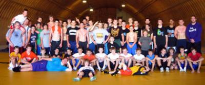 Steven Vashon's Most Interesting Camp in the World Campers pose in the Potato Barn in Quincy, Washington.  70 wrestlers from around the state met there to practice and perform team bonding exercises on July 5-8. 